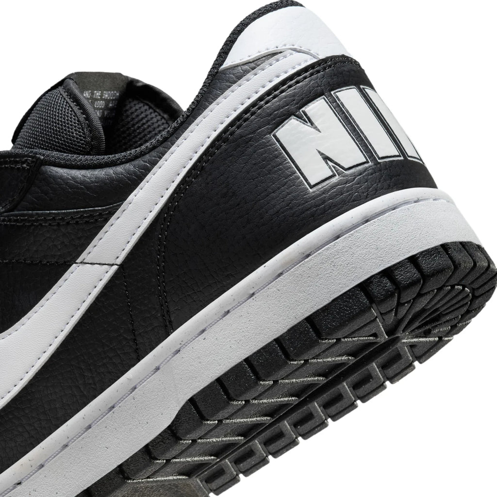 Nike Black Low-Top Sneakers with White Swoosh