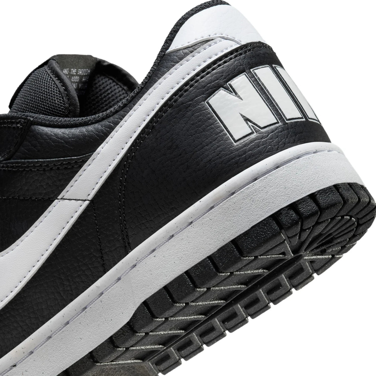 Nike Black Low-Top Sneakers with White Swoosh