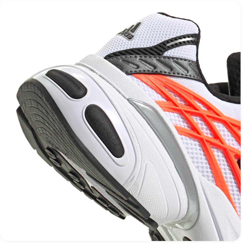 adidas Ozelia White Sneakers with Orange and Black Accents