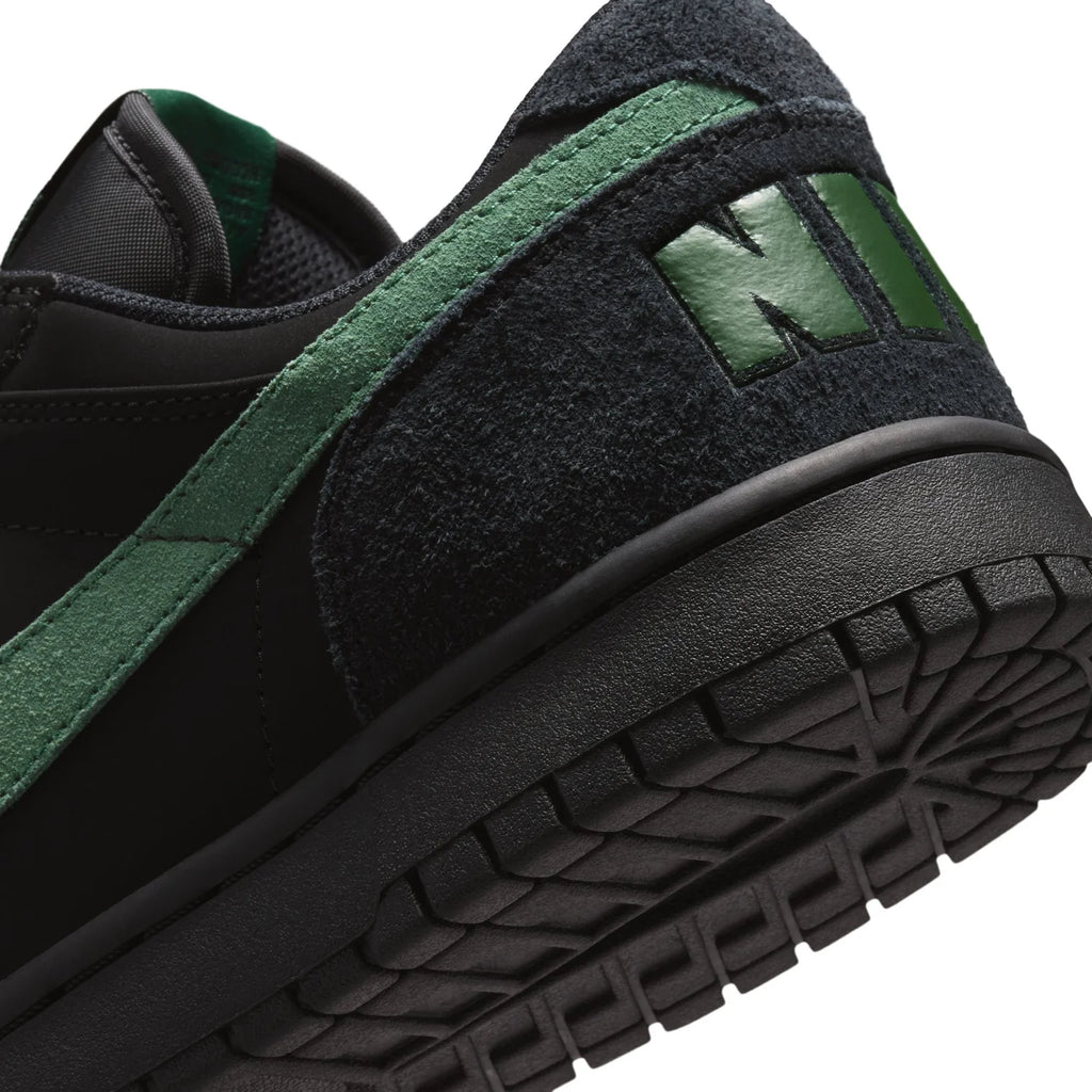 Nike Black Low-Top Sneakers with Green Swoosh