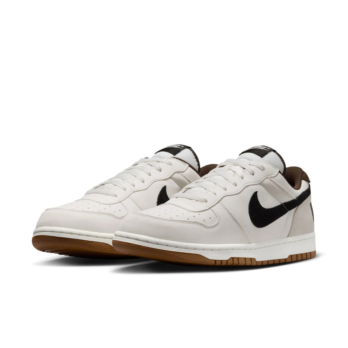Nike White Low-Top Sneakers with Black Swoosh and Gum Sole