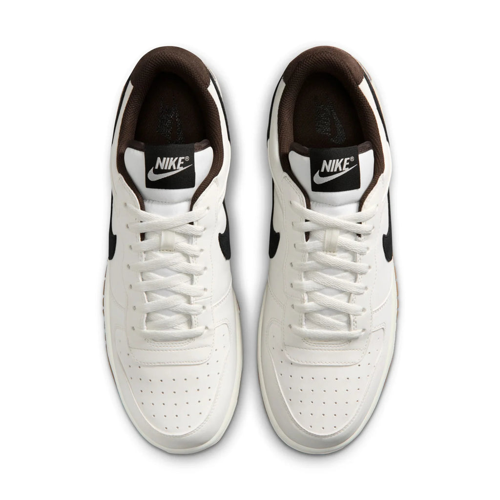 Nike White Low-Top Sneakers with Black Swoosh and Gum Sole