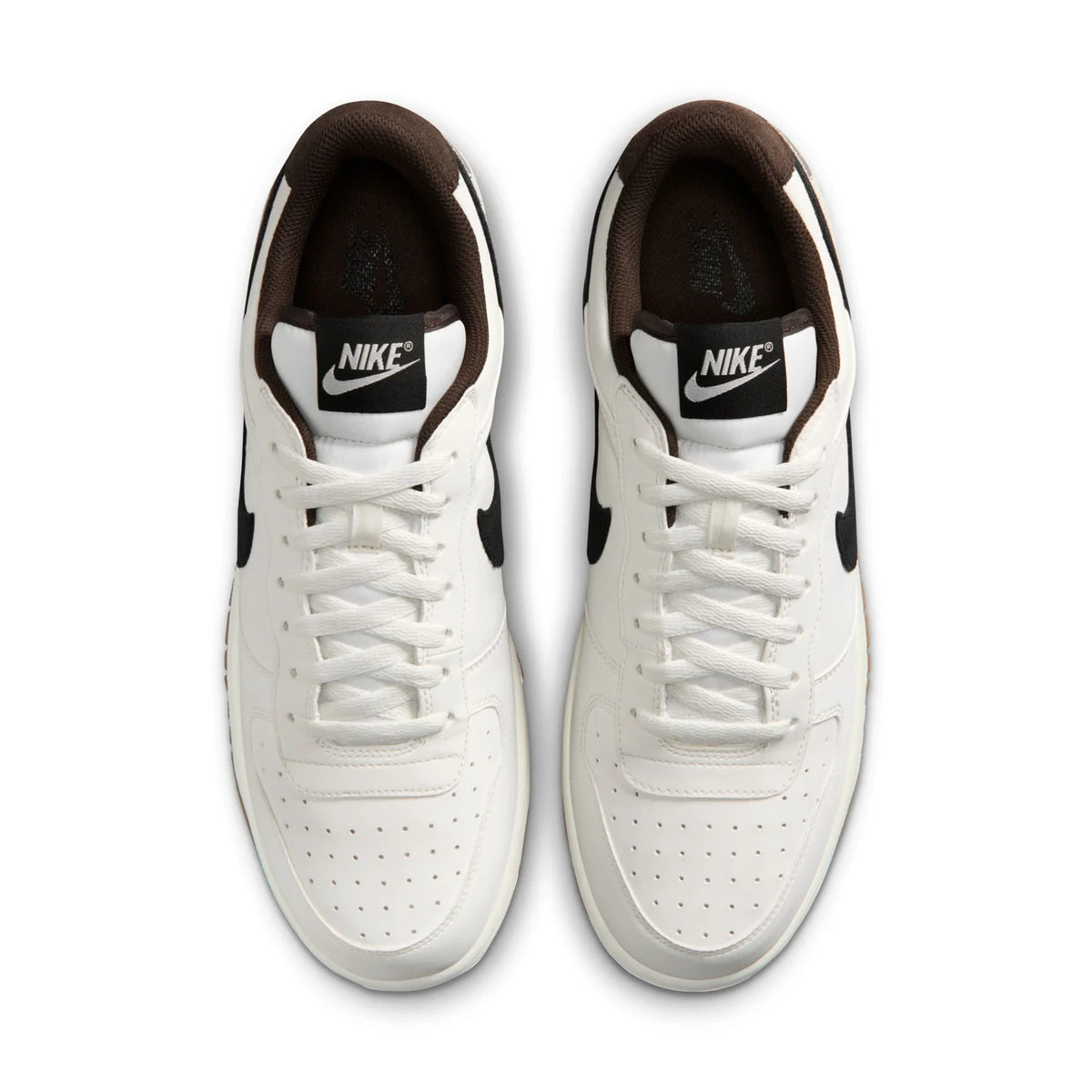 Nike White Low-Top Sneakers with Black Swoosh and Gum Sole