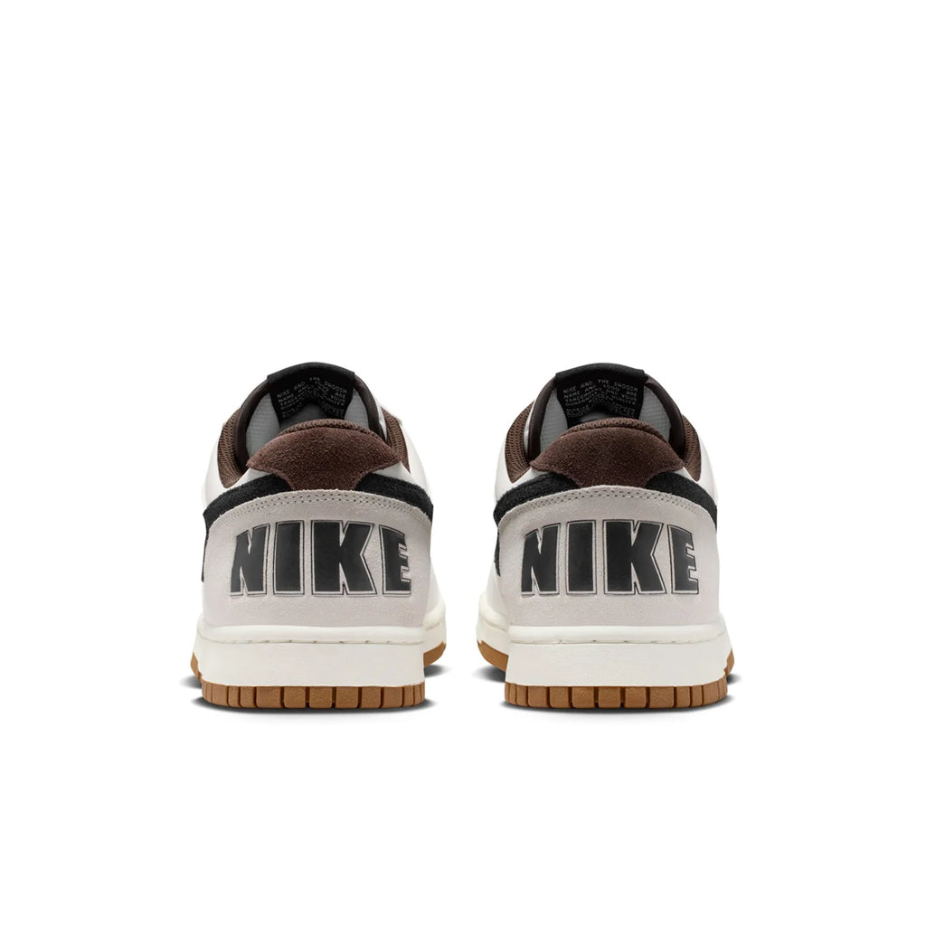 Nike White Low-Top Sneakers with Black Swoosh and Gum Sole