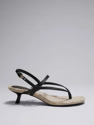 Fringed leather sandals